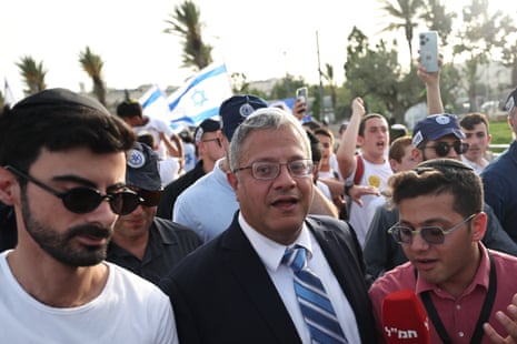 Israeli far-right minister of national security Itamar Ben-Gvir, surrounded by security.
