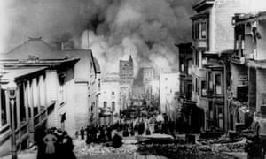 People on Sacramento street watch smoke rise from fires after an 8.3e earthquake hit in San Francisco, 1906.