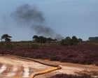 ‘Real struggle’ to tame New Forest blaze as UK set for hottest summer on record