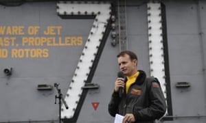 U.S. Navy Capt. Brett Crozier, commanding officer of the aircraft carrier USS Theodore Roosevelt (CVN 71), addresses the crew during an all-hands call on the ship’s flight deck while conducting routine operations in the Eastern Pacific Ocean, last November.