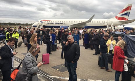 Passengers outside the terminal building as flights were grounded at London City airport.