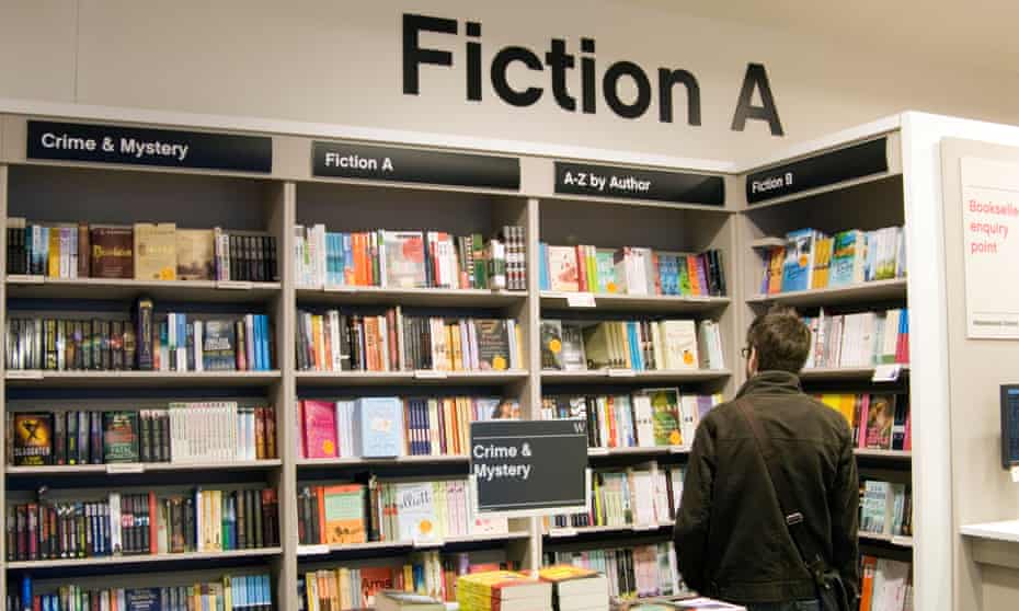 A reader browses the shelves of a bookshop