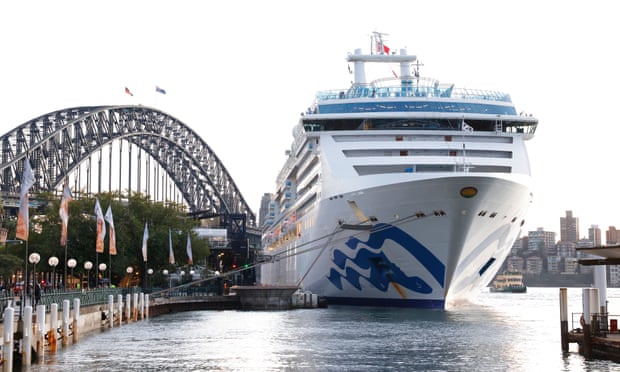 The Covid-hit Coral Princess docks at Circular Quay in Sydney on Wednesday morning