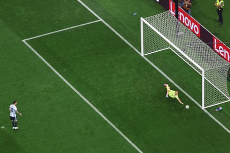 Austria goalkeeper Alexander Schlager dives for the ball as the shot goes wide.
