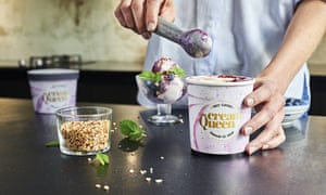 Scooping ice cream from tub