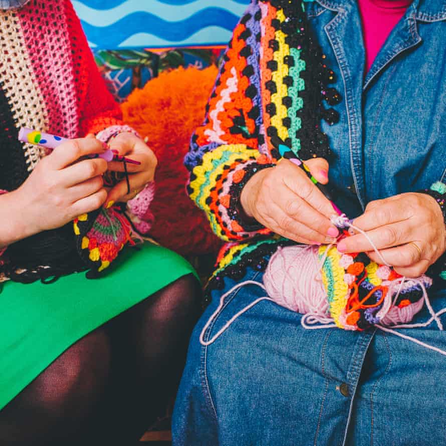 Two women crocheting