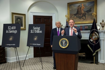 Lee Zeldin speaks as Donald Trump looks at the White House in Washington, DC on Thursday.