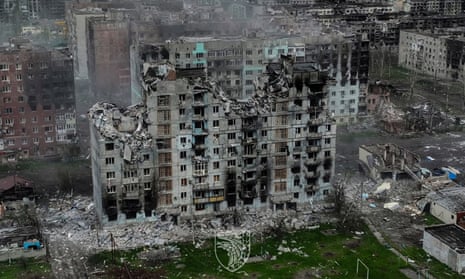 An aerial view shows  a destroyed high-rise building in  Bakhmut