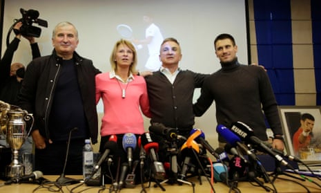 Novak Djokovic's uncle Goran (left), mother Diana, father Srdjan, and brother Djordje pose for photographers after a press conference in Belgrade, Serbia.