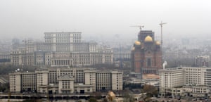 Aerial view of the Cathedral of National Redemption (R), flanked by Parliament Palace in Bucharest.