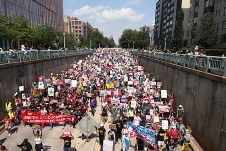 people hold signs