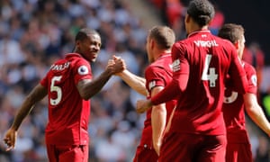 Gini Wijnaldum is congratulated by James Milner after opening the scoring.