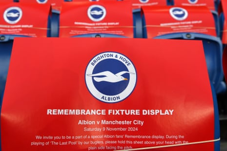 Sheets of card have been left on Amex Stadium seats to help supporters create a Remembrance Day tifo.