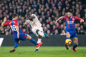 Lukacu strikes his leg for United.