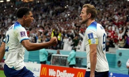 Harry Kane (right) celebrates with Jude Bellingham after making it 1-1 against France