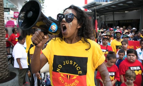 Ruby Wharton rallies members from the Stolenwealth Games protest group in Surfers Paradise.