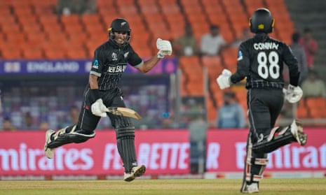 New Zealand's Rachin Ravindra and Devon Conway complete the winning run in a sparsely filled stadium.