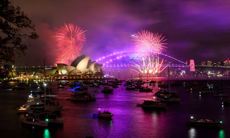 New Year’s Eve celebrations in SydneyEarly fireworks explode over Sydney Opera House.