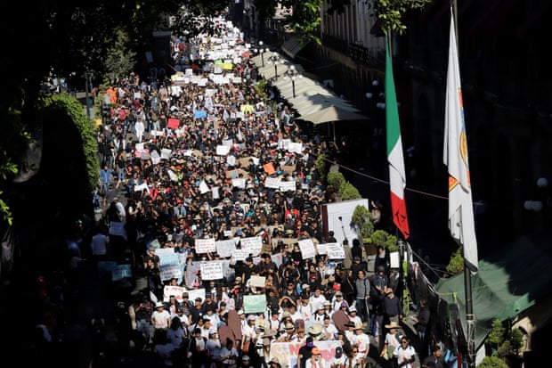Hundreds of students take part in a march to protest against violence and for the killing of three students and an Uber driver on February 23, in Puebla, Mexico March 5, 2020