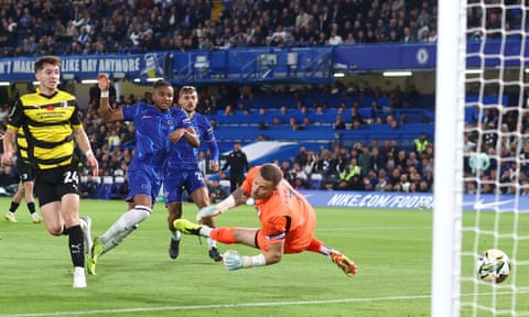 Christopher Nkunku scores Chelsea’s first goal against Barrow at Stamford Bridge.