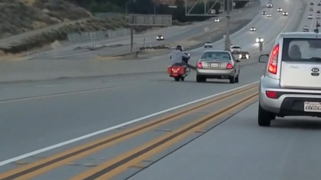 Road Rage Motorcyclist Kicks Car Causing Dramatic Pile Up Road Rage Motorcyclist Kicks Car Causing Dramatic Pile Up