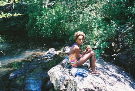Mekdela Maskal in the stream near her home in 2003