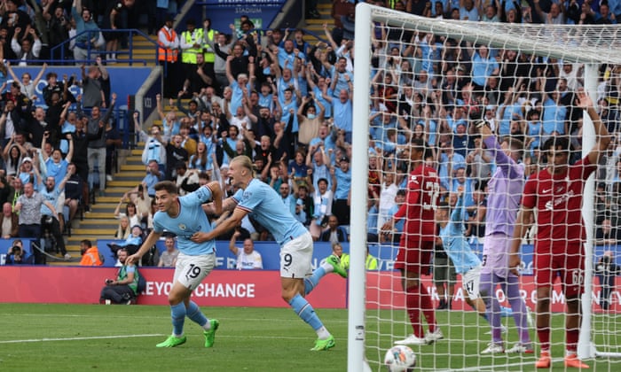 Julian Alvarez (left) celebrates after putting Manchester City back on level terms.