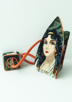 A travel iron by Swedish designer Ulla-Stina Wikander, who covers 1970s household objects in second-hand cross-stitches