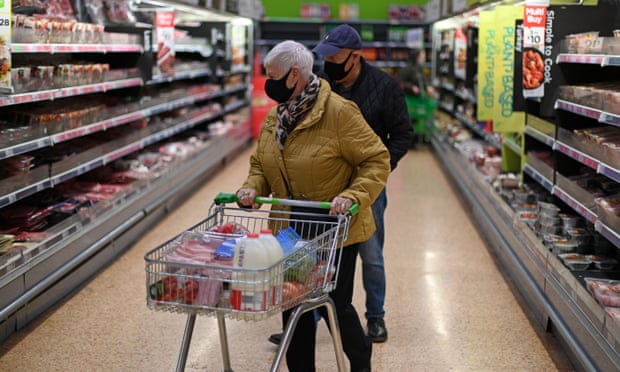 Shoppers in an Asda store