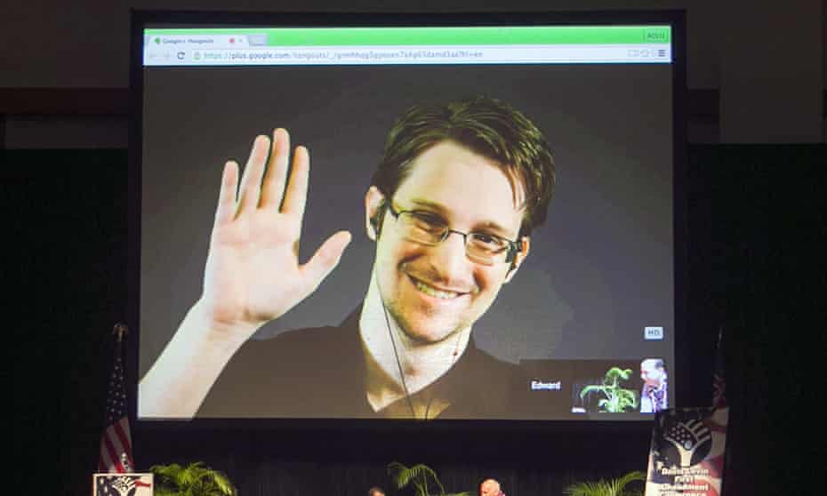 Edward Snowden appears on a live video feed broadcast from Moscow at a 2015 event.