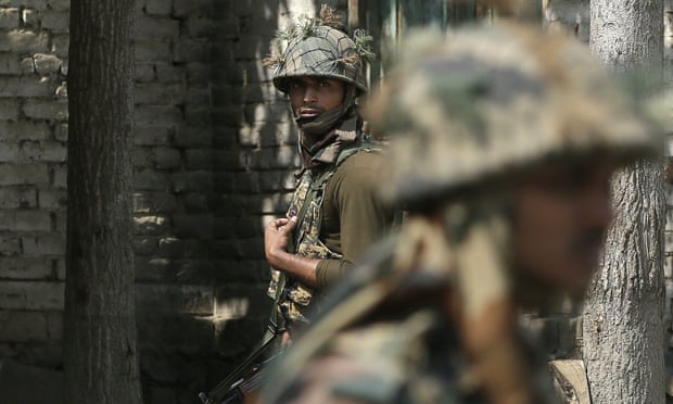 Indian soldiers patrol near the line of control in Kashmir following the 18 September attack.