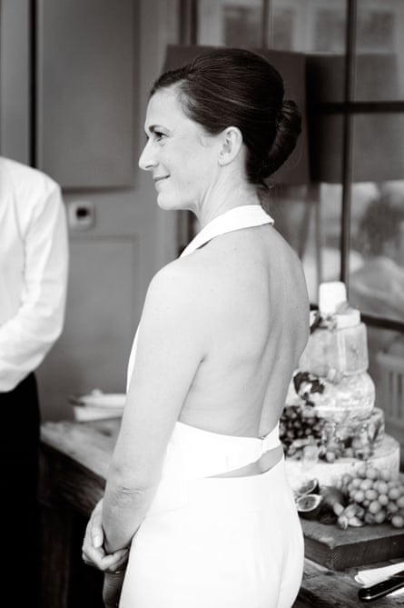 Woman in white backless waistcoat