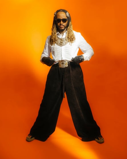 thundercat orange background legs astride