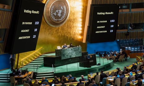 The vote results are shown on screens at the UN general assembly in New York