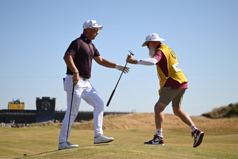Lucas Herbert and his caddie on the 14th.
