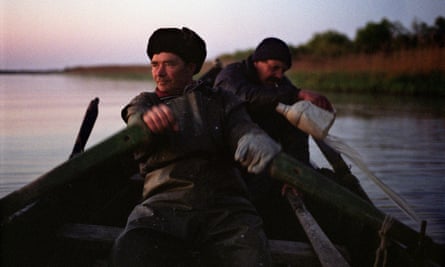 Rowing home: fisherman on the Danube.