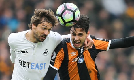 Swansea’s Fernando Llorente, left, and Hull’s Andrea Ranocchia compete for the ball in March’s Premier League encounter. Hull won 2-1, their third victory over Swansea in all competitions this season.