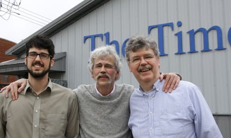 Art Cullen, centre, the 2017 winner of the Pulitzer prize for editorial writing, with his son, Tom and brother John