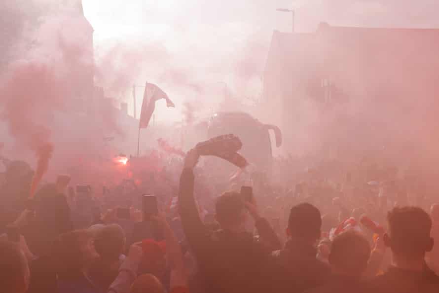 Liverpool v Villarreal: Champions League semi-final, first leg – live! | Champions League 14 Liverpool fans cheer the arrival of the Liverpool team bus.