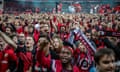 Bayer Leverkusen fans poured down the steps and on to the pitch to celebrate the historic win 