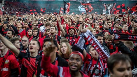 Leverkusen fans storm pitch to celebrate first ever Bundesliga victory – video