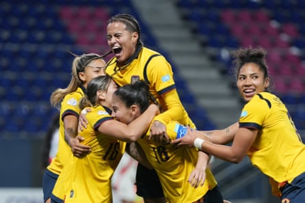 Ecuador players observe a extremity during their 3-1 triumph complete Peru