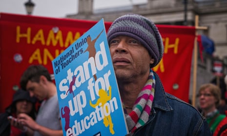 Members of Unison and the NUT stage a one-day strike and protest in central London