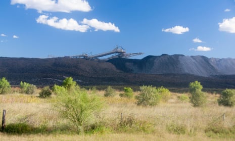 Open cut or open cast coal mine with coal loading machinery Near Clermont Central Queensland Australia.