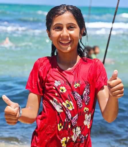 Tulin Al-Othmaneh gives the thumbs up sign