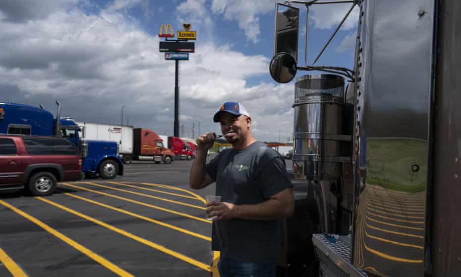 Truck driver Sammy Lloyd in Virginia last year. Most truck drivers work 60 to 70 hours per week without overtime pay, according to Truckers Movement for Justice.