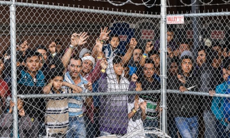 Migrants being held for processing under the Paso del Norte bridge in El Paso, Texas on 27 March. 