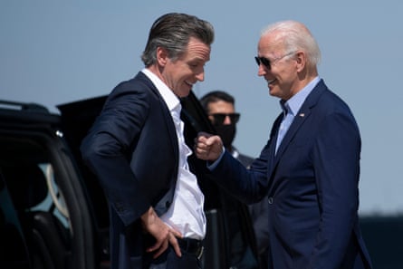 Newsom greets Biden in Mather, California.