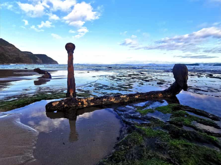 Two huge rusting anchors poke from the sand at Wreck beach