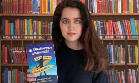 Siena Castellon with her book, The Spectrum Girl’s Survival Guide